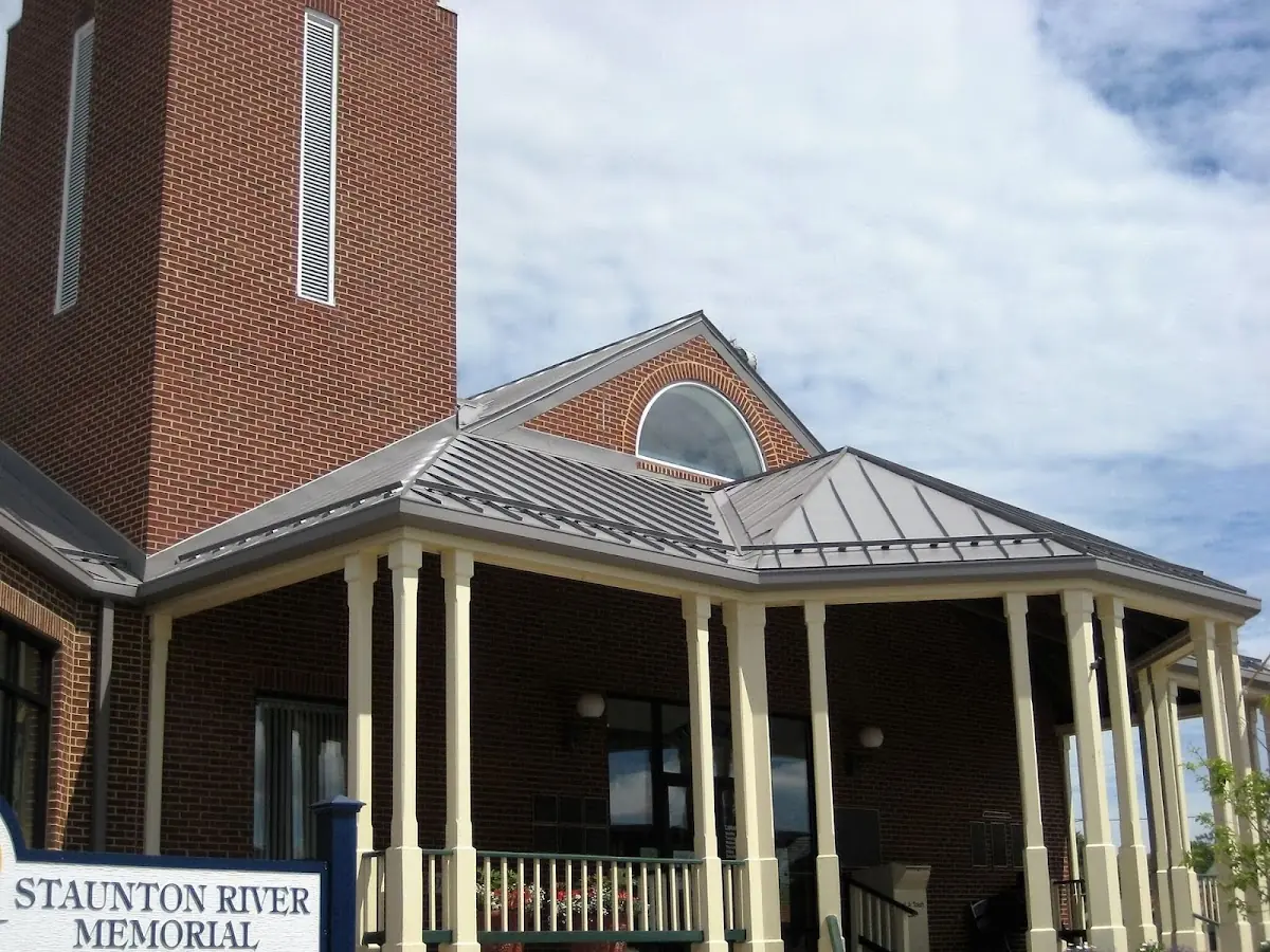 Skilled roofing craftsmen working on a residential roof in Franktown
